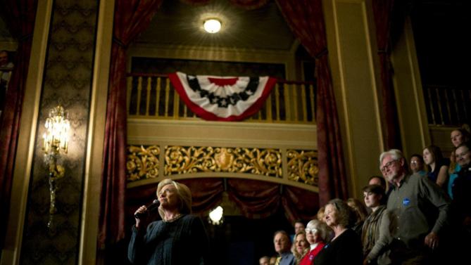 Democratic presidential candidate Hillary Clinton, left, speaks at a rally held at the Orpheum Theatre, Tuesday, Jan. 5, 2016, in Sioux City, Iowa. (AP Photo/Jae C. Hong)
