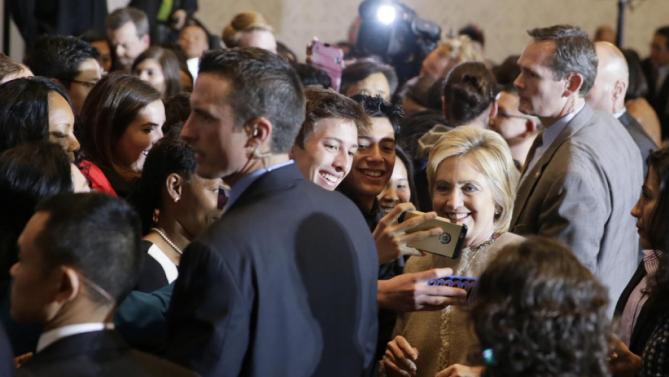 Democratic presidential hopeful former Secretary of State Hillary Clinton greets Asian American and Pacific Islander supporters in San Gabriel, Calif., Thursday, Jan. 7, 2016. (AP Photo/Damian Dovarganes)