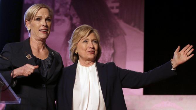 Democratic presidential candidate Hillary Clinton, right, stands with Cecile Richards, Planned Parenthood's president, during an event Sunday, Jan. 10, 2016, in Hooksett, N.H., during which Planned Parenthood endorsed Clinton in the presidential race. The endorsement by the group's political arm marks Planned Parenthood's first time wading into a presidential primary. (AP Photo/Steven Senne)