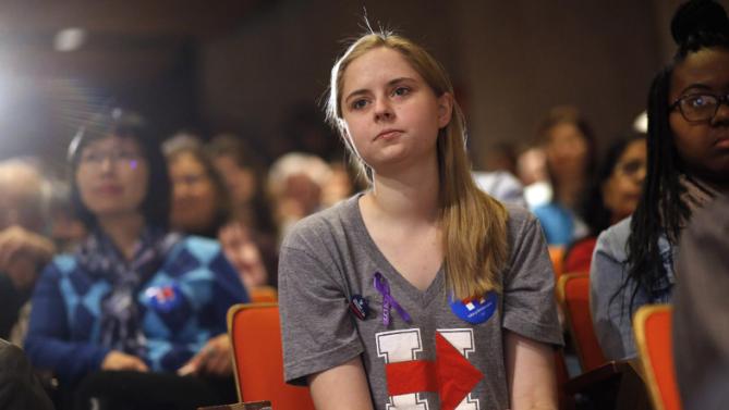 Iowa State University student Colette Manley listens as Democratic presidential candidate Hillary Clinton speaks during a campaign event on the university campus in Ames, Iowa, Tuesday, Jan. 12, 2016. (AP Photo/Patrick Semansky)