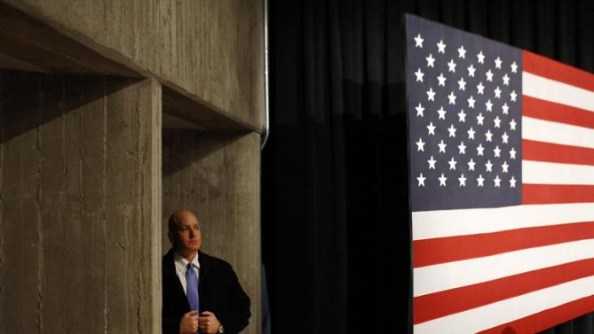 A U.S. Secret Service agent stands off stage before a campaign event featuring Democratic presidential candidate Hillary Clinton at Iowa State University in Ames, Iowa, Tuesday, Jan. 12, 2016. (AP Photo/Patrick Semansky)