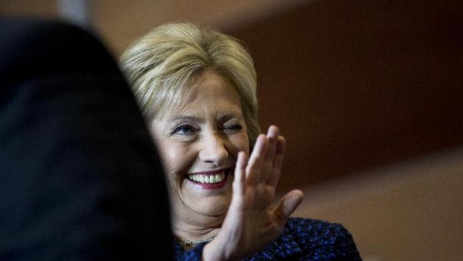 Democratic presidential candidate Hillary Clinton waves toward the crowd while being introduced during a rally on the campus of Simpson College, Thursday, Jan. 21, 2016, in Indianola, Iowa. (AP Photo/Jae C. Hong)