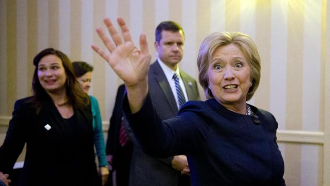 Democratic presidential candidate Hillary Clinton waves Friday, Jan. 22, 2016, at a NARAL Pro-Choice dinner in Concord, N.H. (AP Photo/Matt Rourke)
