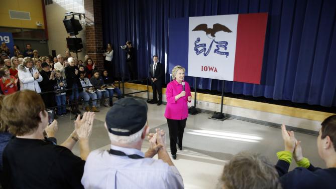 People applaud Democratic presidential candidate Hillary Clinton during a town hall at Eagle Heights Elementary School in Clinton, Iowa, Saturday, Jan. 23, 2016. (AP Photo/Patrick Semansky)
