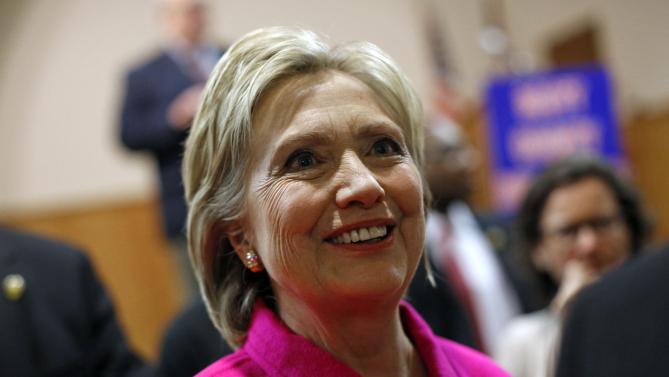 Democratic presidential candidate Hillary Clinton greets attendees after speaking at the Scott County Democrats Red, White and Blue Banquet in Davenport, Iowa, Saturday, Jan. 23, 2016. (AP Photo/Patrick Semansky)