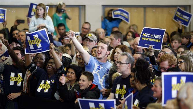 Supporters cheer during a campaign event featuring Democratic presidential candidate Hillary Clinton at Valley Southwoods Freshman High School in West Des Moines, Iowa, Sunday, Jan. 24, 2016. (AP Photo/Patrick Semansky)