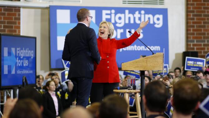 Democratic presidential candidate Hillary Clinton greets Chad Griffin, president of the Human Rights Campaign, at Valley Southwoods Freshman High School in West Des Moines, Iowa, Sunday, Jan. 24, 2016. (AP Photo/Patrick Semansky)