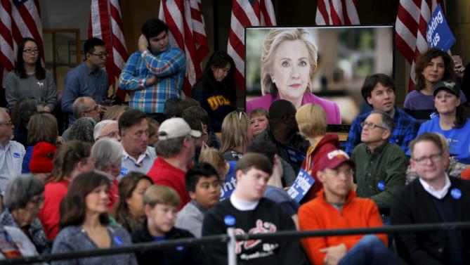 A video introduces U.S. Democratic presidential candidate Hillary Clinton at a "Get Out to Caucus" rally at Iowa State University in Ames, Iowa January 30, 2016.  REUTERS/Brian Snyder