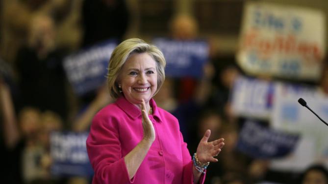 Democratic presidential candidate Hillary Clinton reacts to supporters after speaking at a campaign rally at the Iowa State Historical Museum, Monday, Jan. 4, 2016, in Des Moines, Iowa. (AP Photo/Charlie Neibergall)