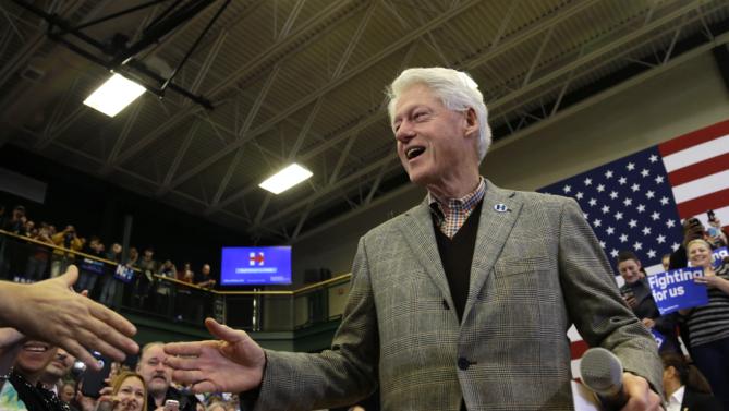 Former President Bill Clinton greets a supporter at a campaign event for Democratic presidential candidate Hillary Clinton, Tuesday, Feb. 2, 2016, in Nashua, N.H. (AP Photo/Elise Amendola)