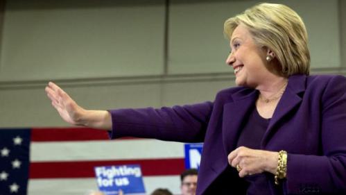 Democratic presidential candidate Hillary Clinton waves at supporters as she arrives for an event in Hampton, N.H., Tuesday, Feb. 2, 2016, Clinton's first day in New Hampshire after winning the Iowa Caucus. (AP Photo/Jacquelyn Martin)