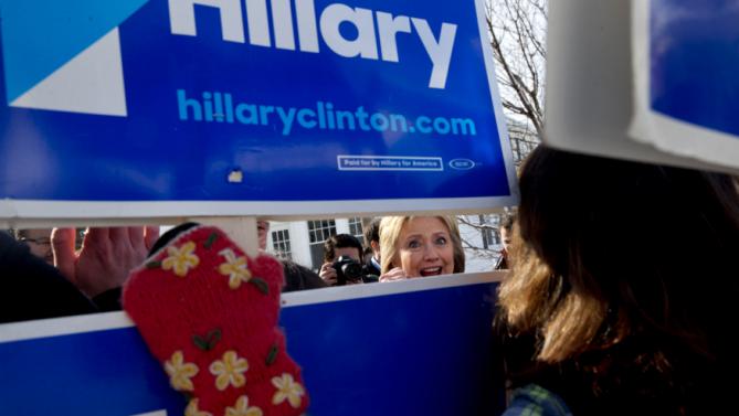 Democratic presidential candidate Hillary Clinton greets supporters during a campaign stop in a Manchester, N.H., neighborhood Saturday Feb. 6, 2016. (AP Photo/Jacquelyn Martin)