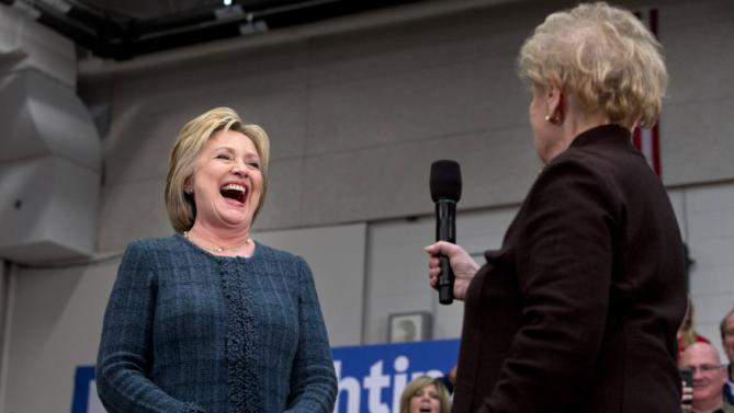 Democratic presidential candidate Hillary Clinton reacts as former Secretary of State Madeleine Albright says, "there’s a special place in hell for women who don’t help each other," at a campaign event at Rundlett Middle School, in Concord, N.H., Saturday Feb. 6, 2016. (AP Photo/Jacquelyn Martin)