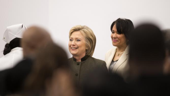Democratic presidential candidate Hillary Clinton appears with Flint Mayor Karen Weaver at the House Of Prayer Missionary Baptist Church, Sunday, Feb. 7, 2016 in Flint, Mich. (AP Photo/Paul Sancya)