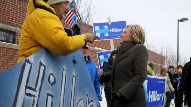 U.S. Democratic presidential candidate Hillary Clinton greets supporters outside a polling place in Derry, New Hampshire February 9, 2016, the day of New Hampshire's first-in-the-nation primary.   REUTERS/Brian Snyder