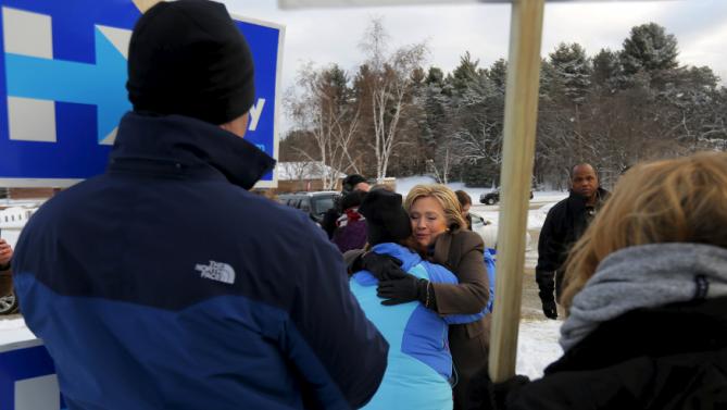 U.S. Democratic presidential candidate Hillary Clinton hugs a supporter outside a polling place in Nashua, New Hampshire February 9, 2016, the day of New Hampshire's first-in-the-nation primary.   REUTERS/Brian Snyder