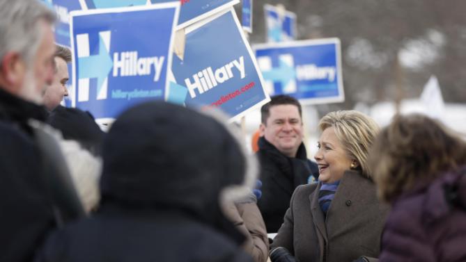 Democratic presidential candidate Hillary Clinton campaigns outside a polling place during the first-in-the-nation presidential primary, Tuesday, Feb. 9, 2016, in Nashua, N.H. (AP Photo/Matt Rourke)