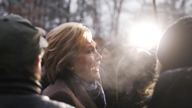 Democratic presidential candidate Hillary Clinton campaigns outside a polling place during the first-in-the-nation presidential primary, Tuesday, Feb. 9, 2016, in Manchester, N.H. (AP Photo/Matt Rourke)