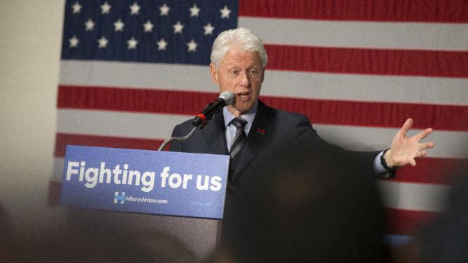 Former President Bill Clinton campaigns for his wife, Democratic presidential candidate Hillary Clinton, Friday, Feb. 12, 2016, at the Clifton Cultural Arts Center in Cincinnati. (AP Photo/John Minchillo)