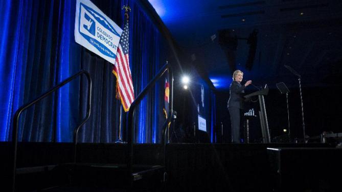 Democratic presidential candidate Hillary Clinton speaks during the Jefferson Jackson Dinner, on Saturday, Feb. 13, 2016, in Denver. (AP Photo/Evan Vucci)