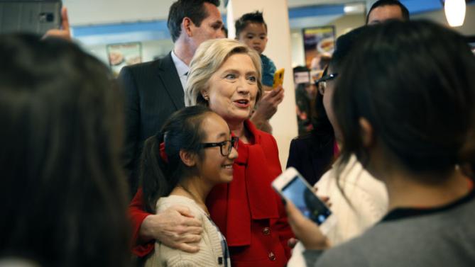 Democratic presidential candidate Hillary Clinton visits Lee's Sandwiches during a campaign stop Sunday, Feb. 14, 2016, in Las Vegas. (AP Photo/John Locher)