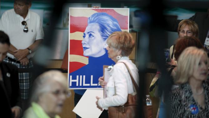 A portrait of Democratic presidential candidate Hillary Clinton is seen during a campaign event at the Port of Palm Beach Cruise Terminal in Riviera Beach, Florida February 15, 2016. REUTERS/Javier Galeano