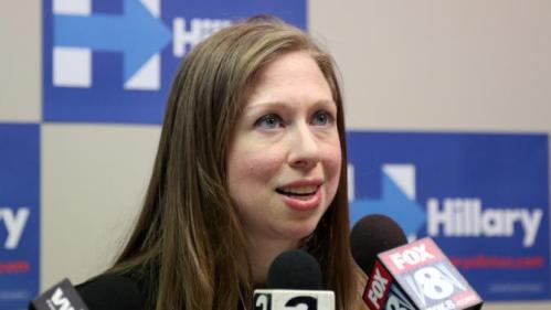 Chelsea Clinton talks to reporters after speaking at the Murtis H. Taylor Community Center, Monday, Feb. 15, 2016, in Cleveland. Clinton made a campaign stop for her mother, Democratic presidential candidate Hillary Clinton, to talk with voters. (AP Photo/Aaron Josefczyk)