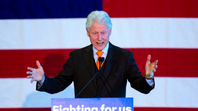 Former President Bill Clinton speaks to the crowd during a rally for Hillary Clinton, who is running for the Democratic presidential nomination, at the Port of Palm Beach in Riviera Beach, Fla., Monday, Feb. 15, 2016. (Richard Graulich/The Palm Beach Post via AP)