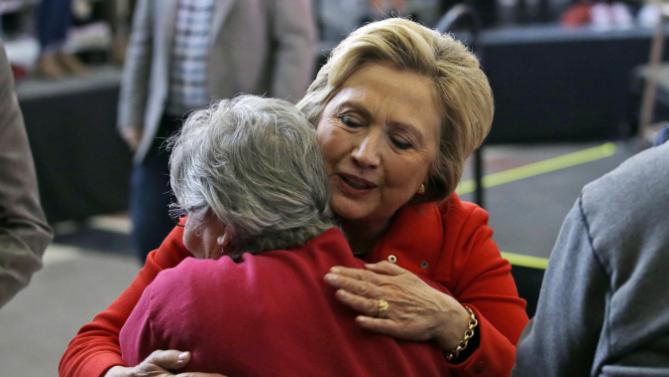Democratic presidential candidate Hillary Clinton hugs a supporter after speaking at a rally at Truckee Meadows Community College on Monday, Feb. 15, 2016, in Reno, Nev. (AP Photo/Marcio Jose Sanchez)