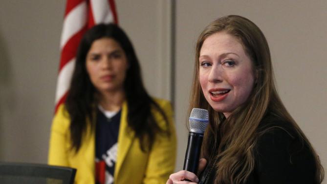 Chelsea Clinton, right, speaks to students during a campaign stop on behalf of her mother, Democratic presidential candidate Hillary Clinton, as actress America Ferrera stands to the left, at The University of Denver, Thursday, Feb. 18, 2016, in Denver. (AP Photo/Brennan Linsley)