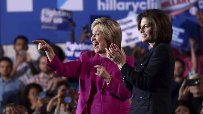 U.S. Democratic presidential candidate Hillary Clinton (L) appears on stage with Nevada Senate candidate Catherine Cortez Masto at a campaign rally at the Laborers International Union hall in Las Vegas, Nevada February 18, 2016. REUTERS/David Becker