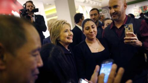 Democratic presidential candidate Hillary Clinton, second from left, meets with MGM Grand employees during a visit to the hotel and casino Thursday, Feb. 18, 2016, in Las Vegas. (AP Photo/John Locher)