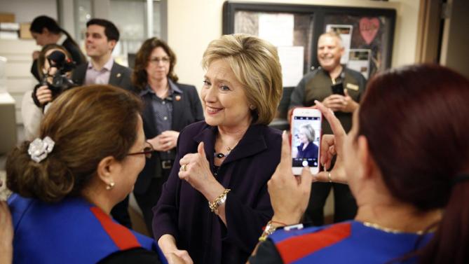 Democratic presidential candidate Hillary Clinton meets with employees of Paris Las Vegas during a visit to the hotel and casino Thursday, Feb. 18, 2016, in Las Vegas. (AP Photo/John Locher)