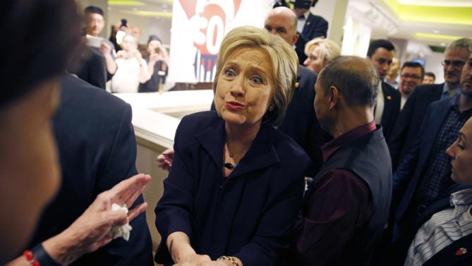 Democratic presidential candidate Hillary Clinton reacts while meeting an MGM Grand employee during a visit to the hotel and casino Thursday, Feb. 18, 2016, in Las Vegas. (AP Photo/John Locher)