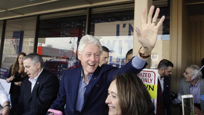 Former President Bill Clinton waves at supporters as he campaigns for his wife, Democratic presidential candidate Hillary Clinton, Friday, Feb. 19, 2016, in Reno, Nev. (AP Photo/Marcio Jose Sanchez)