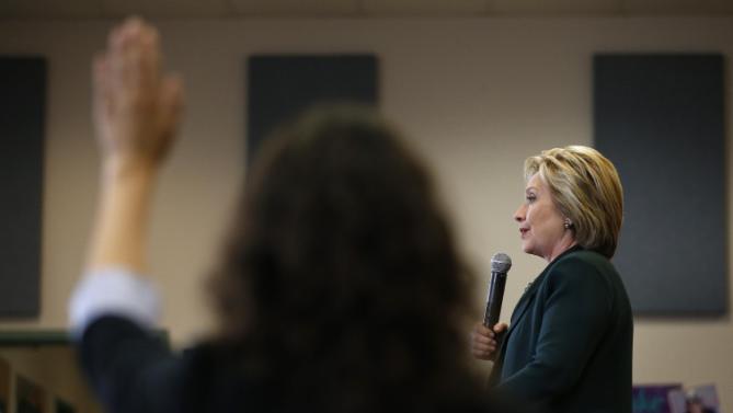 Democratic presidential candidate Hillary Clinton takes questions while speaking to students at Del Sol High School, Friday, Feb. 19, 2016, in Las Vegas. (AP Photo/John Locher)