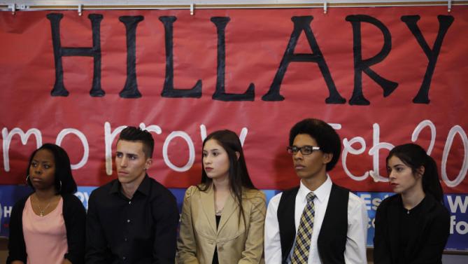 Students listen to Democratic presidential candidate Hillary Clinton at Del Sol High School, Friday, Feb. 19, 2016, in Las Vegas. (AP Photo/John Locher)