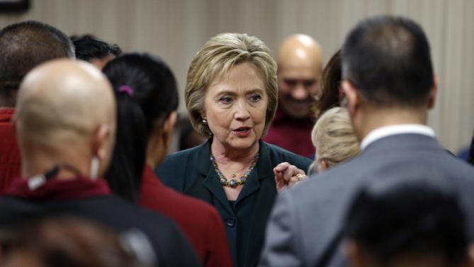 Democratic presidential candidate Hillary Clinton meets with employees of New York-New York Hotel & Casino during a visit to the hotel and casino school, Friday, Feb. 19, 2016, in Las Vegas. (AP Photo/John Locher)