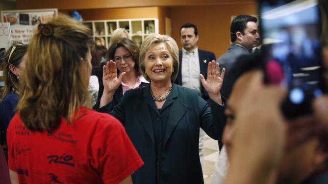 Democratic presidential candidate Hillary Clinton gestures while speaking to people at Planet Hollywood hotel and casino Friday, Feb. 19, 2016, in Las Vegas. (AP Photo/John Locher)