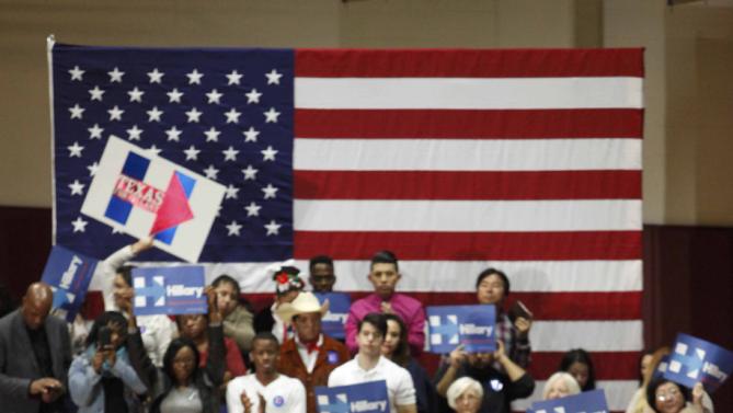U.S. Democratic presidential candidate Hillary Clinton addresses supporters at a late night rally in Houston after winning the Iowa Democratic caucus, February 20, 2016. Picture taken late February 20, 2016. REUTERS/Daniel Kramer