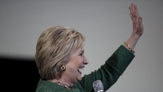 U.S. Democratic presidential candidate Hillary Clinton waves to the crowd before her speech to voters at the Garrick-Boykin Human Development Center at Morris College in Sumter, South Carolina, February 24, 2016. REUTERS/Randall Hill