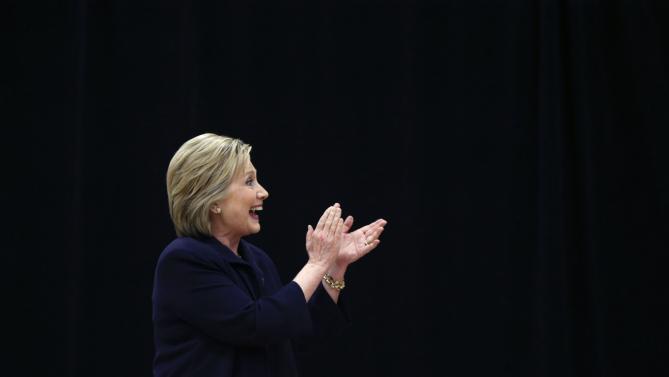 Democratic presidential candidate Hillary Clinton acknowledges the audience as she arrives to speak at a town hall style campaign event at the Williamsburg County Recreation Center in Kingstree, S.C., Thursday, Feb. 25, 2016. (AP Photo/Gerald Herbert)