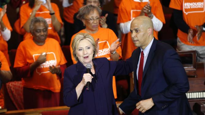 Sen. Corey Booker, D-N.J., introduces Democratic presidential candidate Hillary Clinton at a campaign event at the Cumberland United Methodist Church in Florence, S.C., Thursday, Feb. 25, 2016. (AP Photo/Gerald Herbert)