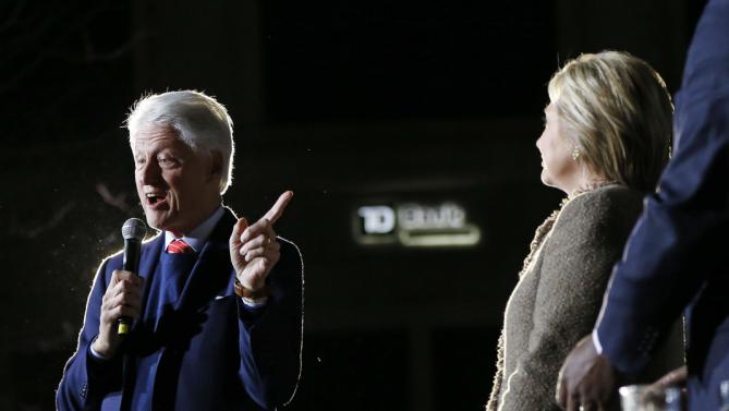 Democratic presidential candidate Hillary Clinton and her husband, former President Bill Clinton, speak at a "Get Out The Vote Rally" in Columbia, S.C., Friday, Feb. 26, 2016. (AP Photo/Gerald Herbert)
