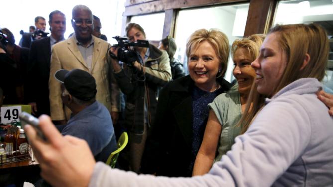 U.S. Democratic presidential candidate Hillary Clinton greets people at a restaurant in Birmingham, Alabama February 27, 2016. REUTERS/Jonathan Ernst