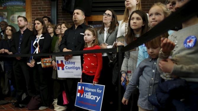 Supporters of U.S. Democratic presidential candidate Hillary Clinton listen to her speak at a rally at Wood Museum of Springfield History in Springfield, Massachusetts February 29, 2016. REUTERS/Jonathan Ernst
