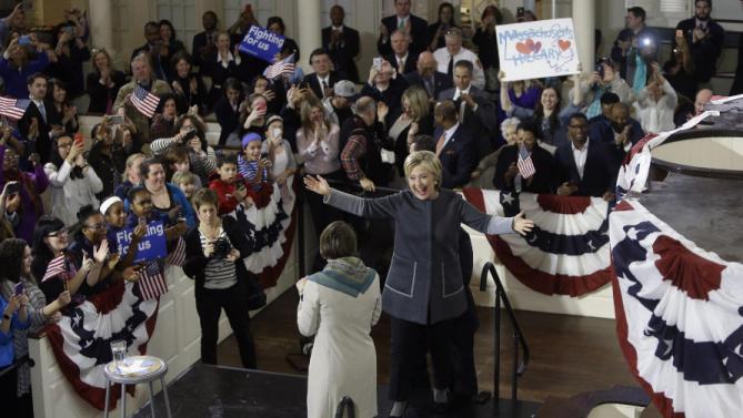Democratic presidential candidate Hillary Clinton takes the stage after being introduced by Massachusetts Attorney General Maura Healey at a campaign event at the Old South Meeting House, Monday, Feb. 29, 2016, in Boston. (AP Photo/Elise Amendola)