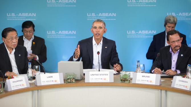 President Barack Obama, center, speaks at the plenary session meeting of ASEAN, the 10-nation Association of Southeast Asian Nations, at the Annenberg Retreat at Sunnylands in Rancho Mirage, Calif., for Monday, Feb. 15, 2016. Sitting with Obama are Laos' president, Choummaly Sayasone, left, and Brunei's sultan, Hassanal Bolkiah, right. (AP Photo/Pablo Martinez Monsivais)