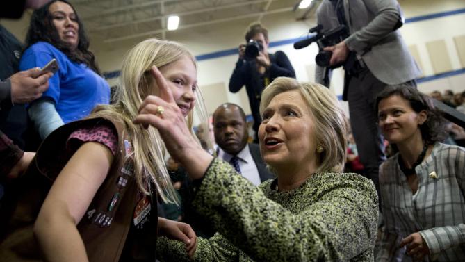 Democratic presidential candidate Hillary Clinton greets people in the audience during a campaign event at Sullivan Community Center and Family Aquatic Center in Vernon Hills, Ill., Thursday, March 10, 2016. (AP Photo/Carolyn Kaster)