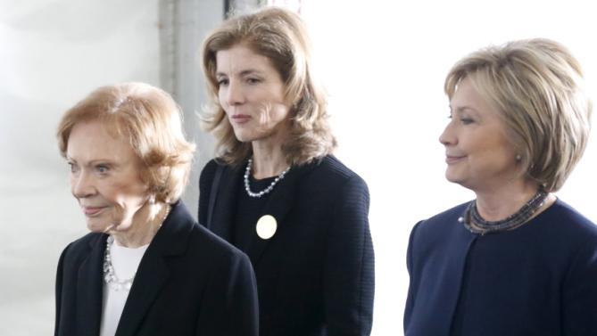Former first lady Rosalynn Carter (L-R), Caroline Kennedy, and Hillary Clinton walk to the grave site after the funeral of Nancy Reagan at the Ronald Reagan Presidential Library in Simi Valley, California, United States, March 11, 2016. REUTERS/Lucy Nicholson
